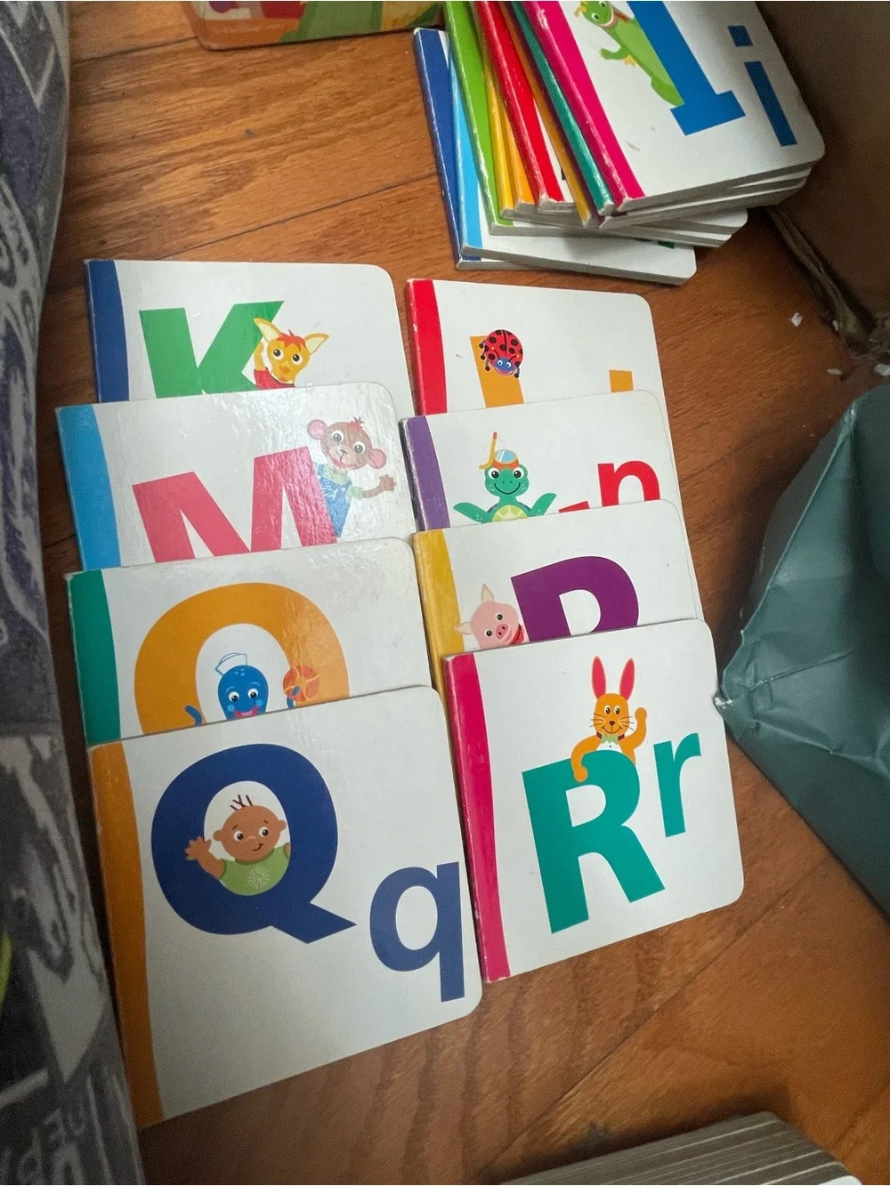 Disney Baby Einstein Alphabooks Board Book Set - Blue, Green, Pink, Teal
